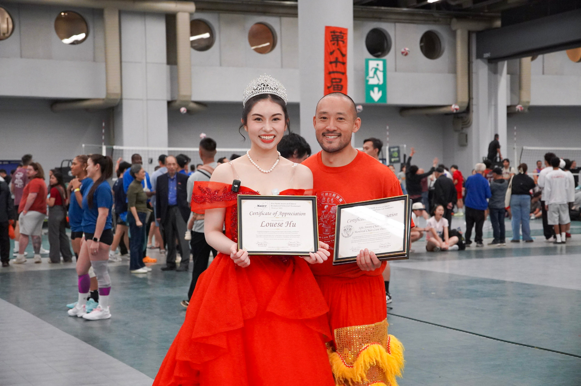 Louese Hu and Sifu Jimmy Chan holding certificates of appreciation
