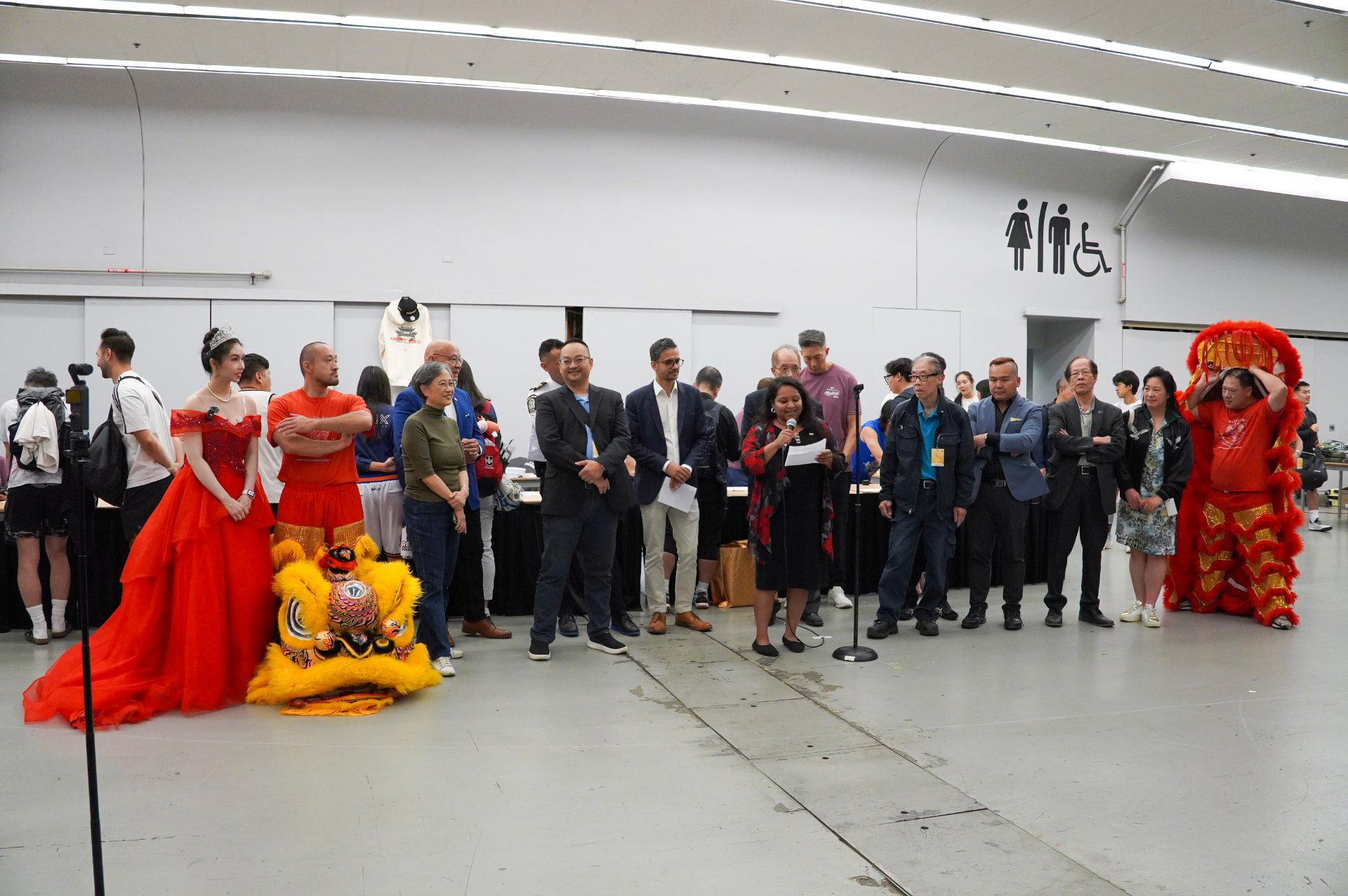 Opening ceremony lineup at the 81st NACIVT with Louese Hu and lion dancers